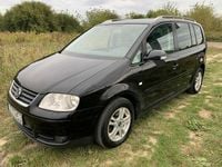 Używany VW Touran 140 KM (102 kW) 2006 Czarny Minivan