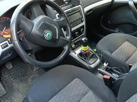 Używany Skoda Octavia 105 KM (77 kW) 2010 Szary Kombi