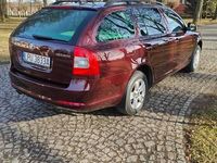 Używany Skoda Octavia Elegance 105 KM (77 kW) 2010 Bordowy Kombi