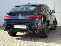 Używany BMW X4 190 KM (139 kW) 2024 Niebieski tanzanite bmw individual metalizowany SUV
