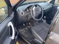 Używany Dacia Duster 105 KM (77 kW) 2013 Czarny SUV