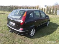 używany Nissan Almera Tino 200000 LPG hak długie opłaty