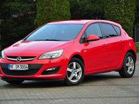 Używany Opel Astra 115 KM (84 kW) 2015 Czerwony (metalik) Sedan/Limuzyna