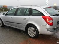 Używany Renault Laguna III 130 KM (95 kW) 2007 Srebrny Kombi