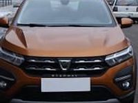 Używany Dacia Sandero 91 KM (66 kW) 2021 Pomarańczowy Hatchback