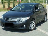 Używany Toyota Corolla 90 KM (66 kW) 2010 Czarny Sedan/Limuzyna