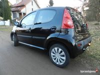 Używany Peugeot 107 68 KM (50 kW) 2011 Czarny Hatchback