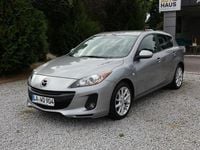 Używany Mazda 3 105 KM (77 kW) 2012 Szary Sedan/Limuzyna