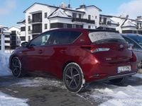 Używany Toyota Auris Hybrid 2017 Bordowy Hatchback