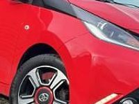 Używany Toyota Aygo 70 KM (51 kW) 2014 Czerwony (metalik) Hatchback