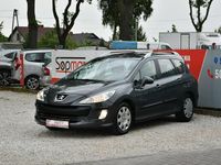 Używany Peugeot 308 SW 90 KM (66 kW) 2010 Szary (metalik, perła) Kombi