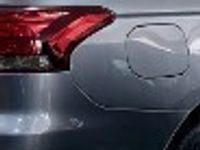 Używany Mitsubishi Outlander P-HEV 121 KM (88 kW) 2016 Szary SUV