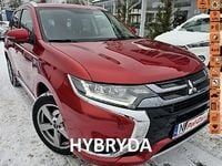 Używany Mitsubishi Outlander P-HEV 202 KM (148 kW) 2016 Bordowy SUV