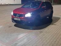 Używany Nissan Qashqai Tekna 110 KM (80 kW) 2011 Bordowy SUV