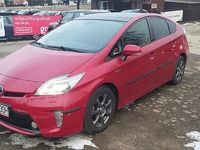 Używany Toyota Prius 100 KM (73 kW) 2014 Czerwony Hatchback