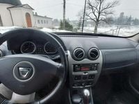 Używany Dacia Duster 105 KM (77 kW) 2013 Brązowobeżowy SUV