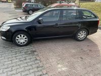 Używany Skoda Octavia 105 KM (77 kW) 2010 Czarny Kombi