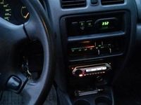 Używany Mazda 323 1997 Grafitowy Hatchback