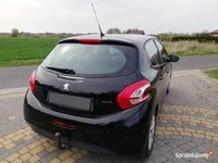 Używany Peugeot 208 82 KM (60 kW) 2013 Czarny Hatchback