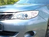 Używany Subaru Impreza 107 KM (78 kW) 2009 Niebieski Hatchback