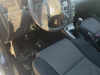 Używany Toyota Corolla 2006 Brązowobeżowy Hatchback