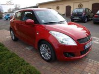 Używany Suzuki Swift Comfort 90 KM (66 kW) 2013 Czerwony ciemny (metalik) Hatchback