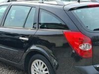 Używany Renault Laguna II 135 KM (99 kW) 2006 Czarny Sedan/Limuzyna