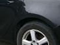 Używany Opel Astra 101 KM (74 kW) 2012 Czarny Sedan/Limuzyna