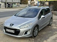 Używany Peugeot 308 SW 112 KM (82 kW) 2013 Srebrny Kombi