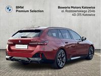 Używany BMW 550e Comfort Edition 489 KM (359 kW) 2025 Czerwony fire red metalizowany Kombi