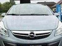 Używany Opel Corsa 70 KM (51 kW) 2012 Srebrny Hatchback