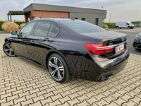 Używany BMW 750 400 KM (294 kW) 2017 Czarny (metalik, perła) Sedan/Limuzyna