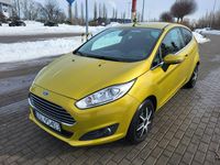Używany Ford Fiesta 101 KM (74 kW) 2013 Żółty (metalik) Hatchback