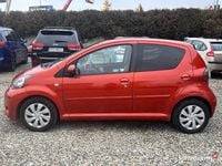 Używany Toyota Aygo 68 KM (50 kW) 2012 Pomarańczowy Hatchback