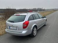 Używany Renault Laguna II 120 KM (88 kW) 2005 Srebrny Sedan/Limuzyna