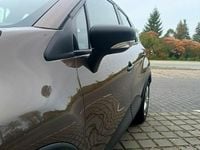 Używany Renault Captur 90 KM (66 kW) 2013 Brązowobeżowy SUV