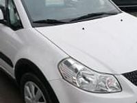 Używany Suzuki SX4 120 KM (88 kW) 2014 Biały Sedan/Limuzyna