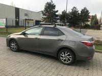 Używany Toyota Corolla 132 KM (97 kW) 2016 Brązowobeżowy Sedan/Limuzyna