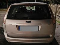 Używany Ford Focus 109 KM (80 kW) 2010 Granatowy Kombi