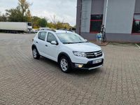 Używany Dacia Sandero Stepway 90 KM (66 kW) 2014 Biały Hatchback
