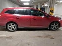 Używany Ford Focus 105 KM (77 kW) 2014 Czerwony Kombi