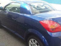 Używany Opel Tigra Enjoy 125 KM (91 kW) 2004 Niebieski (metalik) Kabriolet