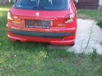 Używany Peugeot 206 2012 Czerwony Sedan/Limuzyna