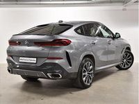 Używany BMW X6 Shadowline 381 KM (280 kW) 2023 Szary skyscraper m metalizowany SUV