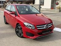 Używany Mercedes A180 122 KM (89 kW) 2015 Czerwony Minivan