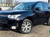 Używany Mitsubishi Outlander P-HEV 121 KM (88 kW) 2014 Czarny SUV