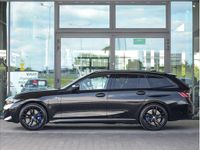 Używany BMW 330e Comfort Edition 292 KM (214 kW) 2023 Black sapphire metallic metalizowany Kombi