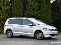 Używany VW Touran 150 KM (110 kW) 2016 Szary (metalik, perła) Minivan