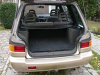 używany Nissan Prairie PRO M11, rok 1992, silnik CA20S, żółte blachy, klima