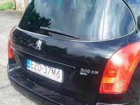 Używany Peugeot 308 SW 2011 Czarny Kombi